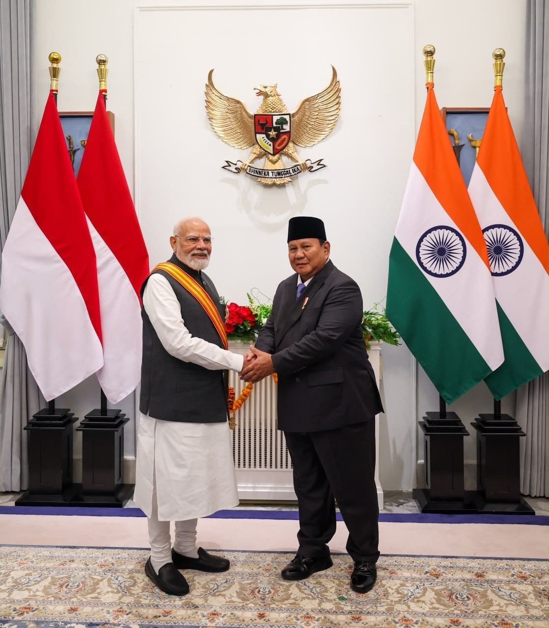 Prime Minister of India receiving the Bintang Adipurna award from Indonesian President Prabowo Subianto
